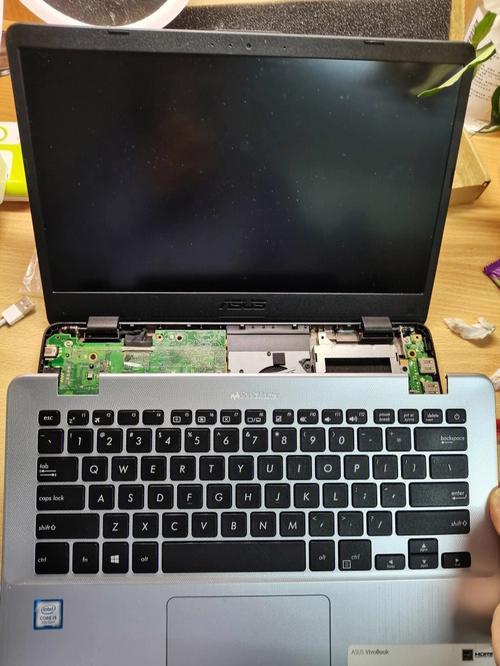 华硕笔记本电脑电池怎么拆